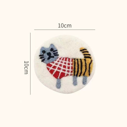 Winter Cat wool felt coaster — handmade needle felted heat-resistant table mat, cute cat design, MeowCeramics