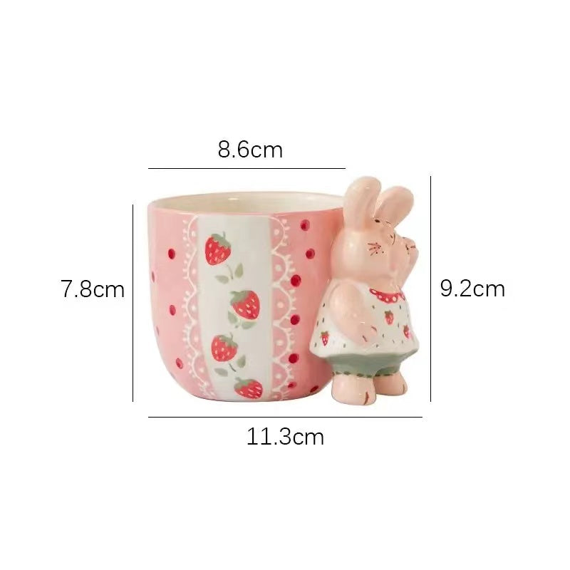 Strawberry kitten mug — 3D kitten handle, hand-painted pink ceramic, size reference, MeowCeramics
