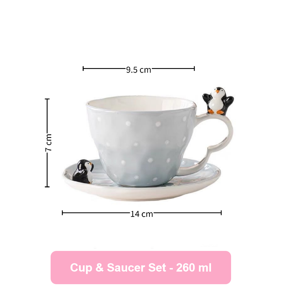 Cup and saucer set with penguin design, including measurements on a white background.