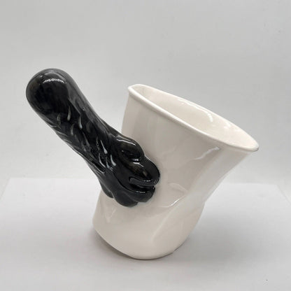 Black cat paw tilt mug — handmade optical illusion ceramic, 250ml, MeowCeramics