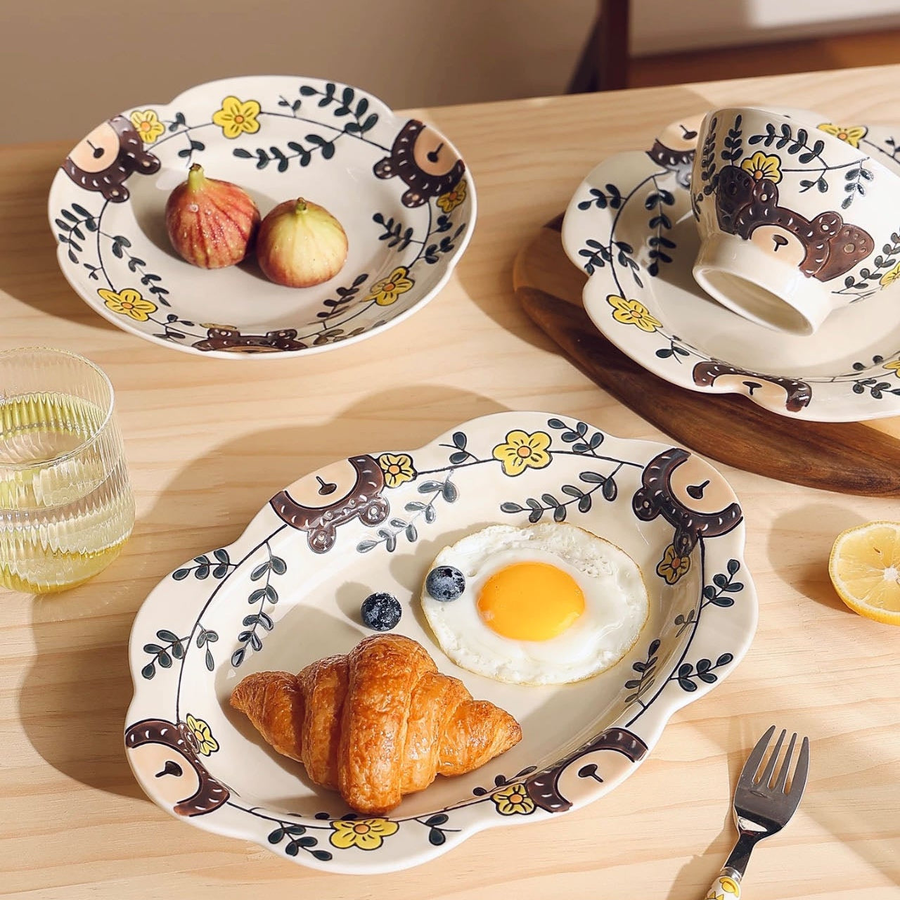 Decorative plates with food on a wooden table