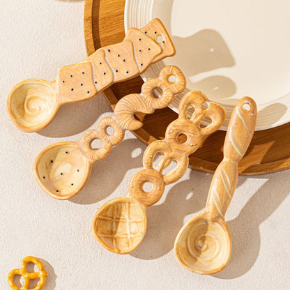 Bakery-inspired ceramic spoon — lifestyle display, 3D bread-textured handle, MeowCeramics