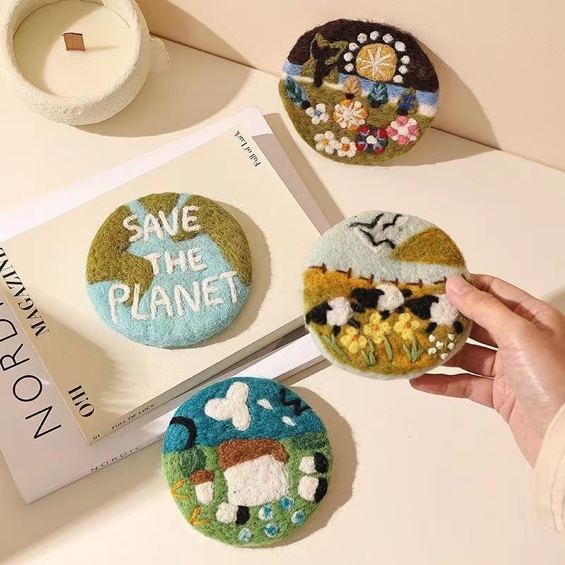 Wool felt coaster size reference — handmade needle felted heat-resistant mat held in hand, MeowCeramics
