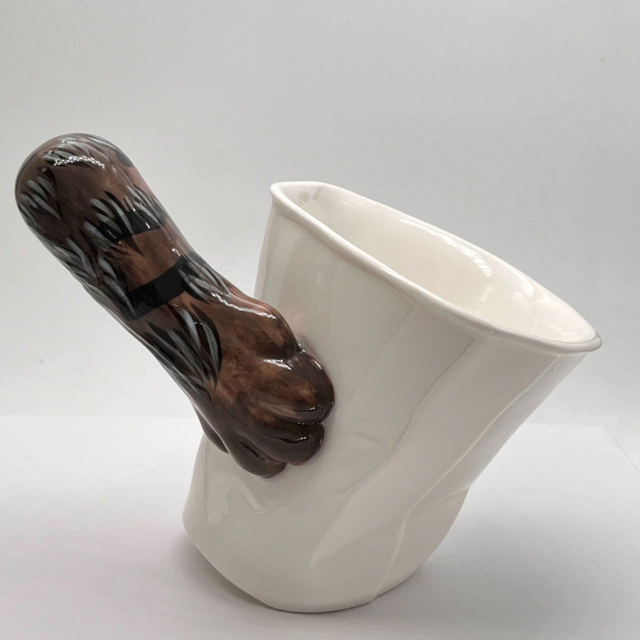 Brindle cat paw tilt mug — handmade optical illusion ceramic, 250ml, MeowCeramics