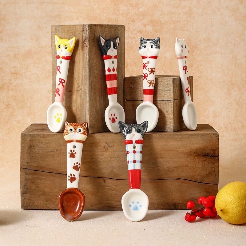 Handmade cat ceramic spoon in use — microwave and dishwasher safe, MeowCeramics