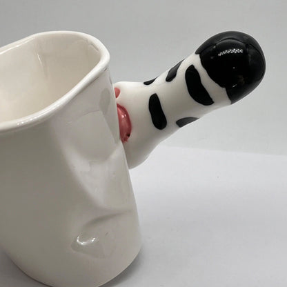 Cat paw mug in use — 250ml capacity, perfect for coffee and tea, MeowCeramics
