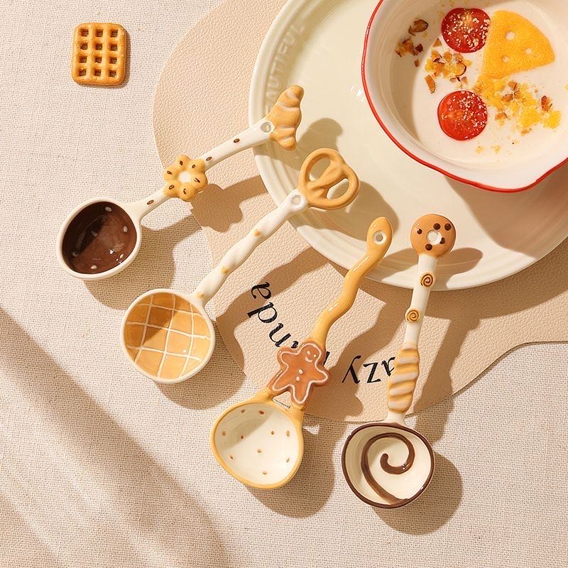 Bread-shaped ceramic long handle soup spoon — lifestyle display, MeowCeramics