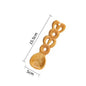 Wheat Ring Croissant ceramic spoon — 3D croissant-textured handle, warm brown glaze, MeowCeramics