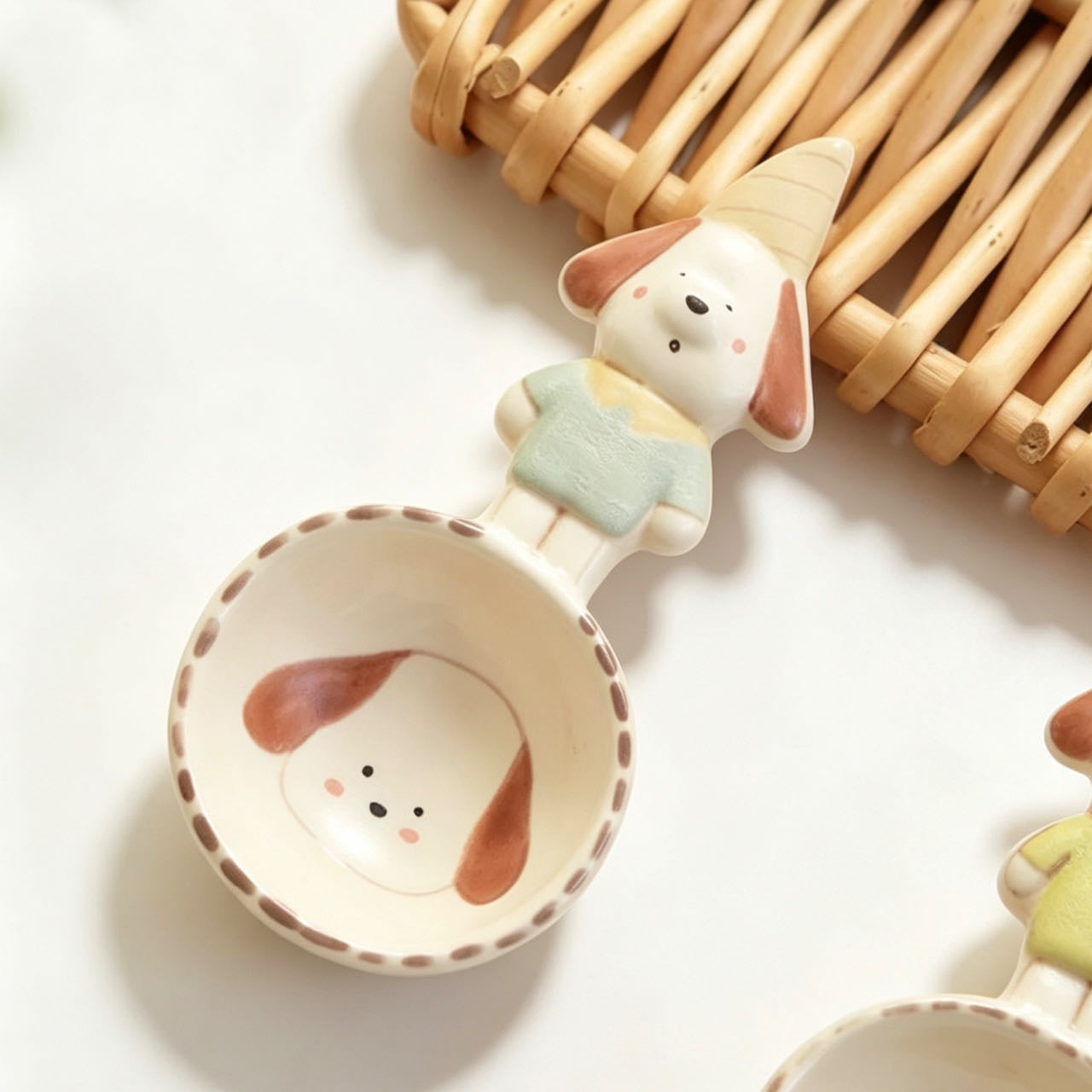 Handmade ceramic puppy spoon in use — unique artisan tableware, MeowCeramics