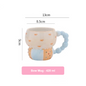 Measurement chart of a bow mug with dimensions and capacity information.