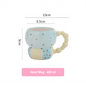 Heart-shaped mug with measurements on a white background