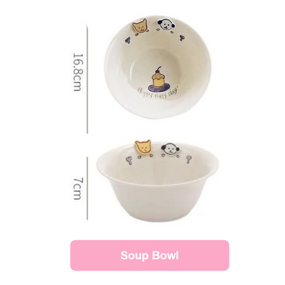 Small white bowl with cartoon designs on a white background