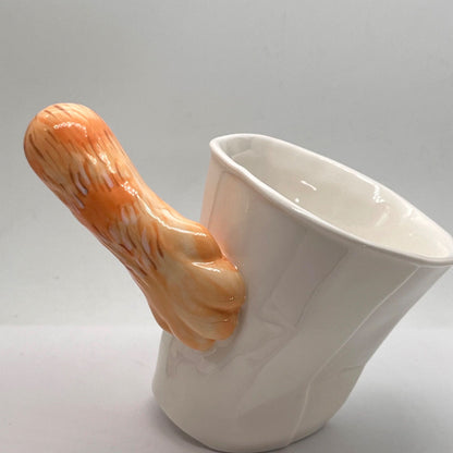 Orange cat paw tilt mug — handmade optical illusion ceramic, 250ml, MeowCeramics