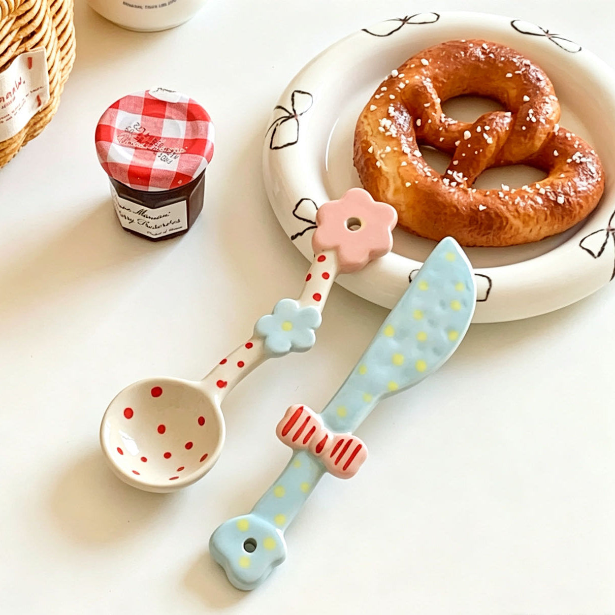 Polka dot handmade ceramic jam knife and coffee spoon — lifestyle display, MeowCeramics