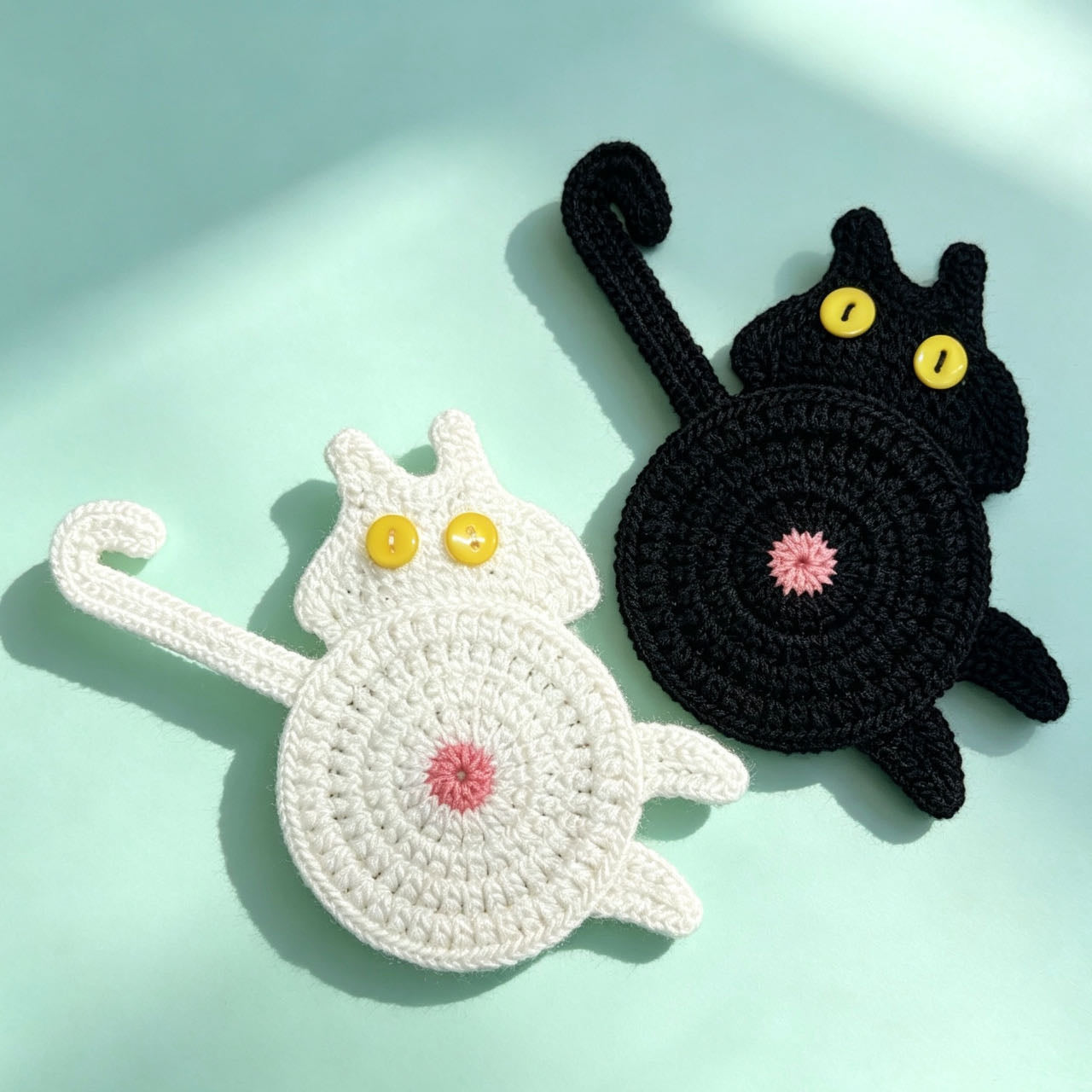 Handmade cat butt coaster — crochet cat tail cup mat, button eyes, tabletop display, MeowCeramics
