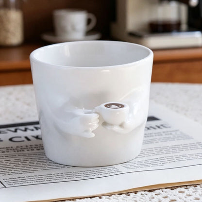 A Coffee Cup That Grows Hands & Makes Latte Art