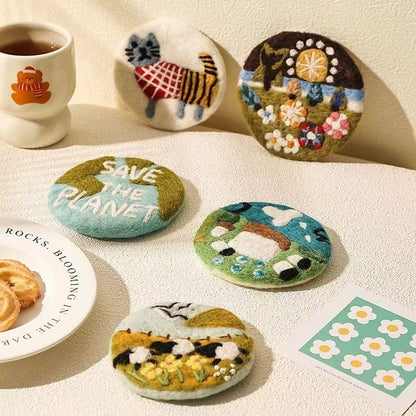 Handmade wool felt coaster — upright display on table, needle felted oil painting style, MeowCeramics