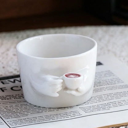 A Coffee Cup That Grows Hands & Makes Latte Art