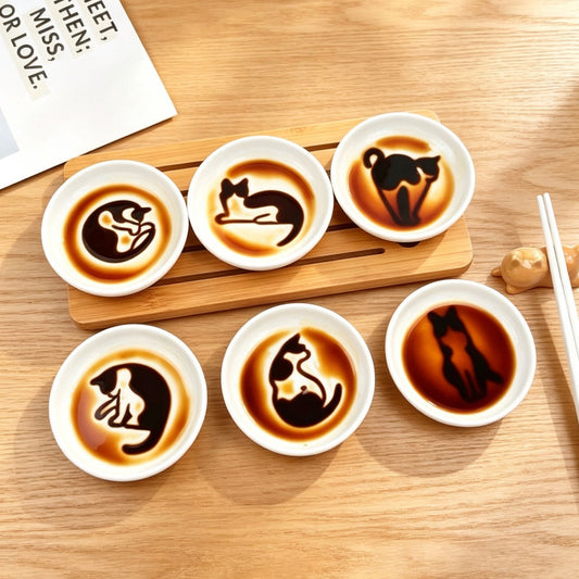 3D cat relief ceramic sauce dish — lifestyle display, magic sauce reveal effect, MeowCeramics
