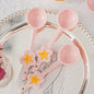 Sakura pink star ceramic dessert spoon — lifestyle display, MeowCeramics