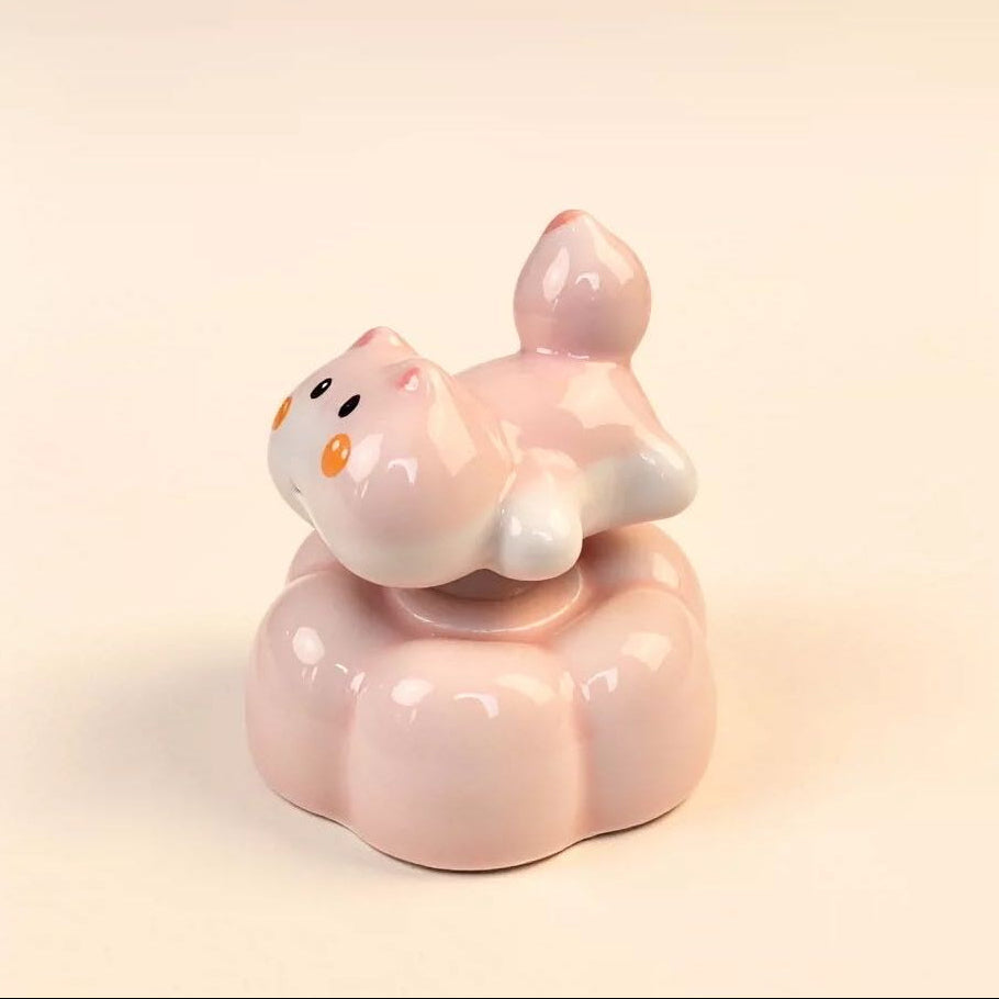 Handmade pink cat ornament in home setting — perfect for desk, shelf and windowsill, MeowCeramics