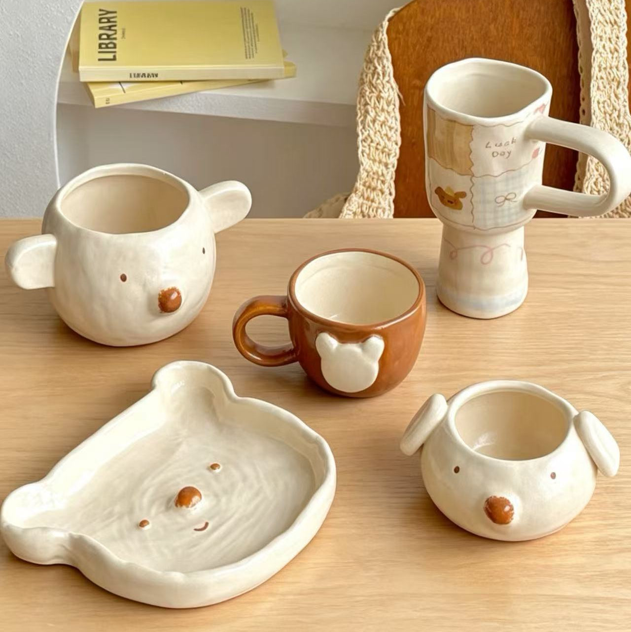 Handmade polar bear ceramic bowl and plate — unglazed base, natural clay texture, MeowCeramics