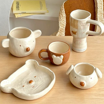 Handmade polar bear ceramic bowl and plate — unglazed base, natural clay texture, MeowCeramics
