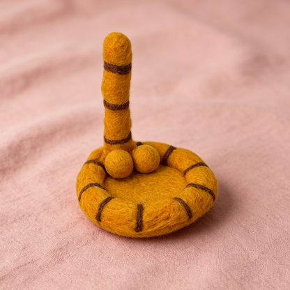 Handmade wool felt cat tail coaster — orange variant display, MeowCeramics